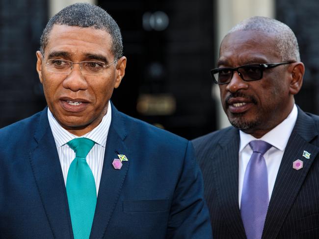 Prime Minister of Jamaica Andrew Holness (L) and Prime Minister of the Bahamas Hubert Minnis (R) both met with Theresa May over the issue. Picture: Jack Taylor/Getty Images.