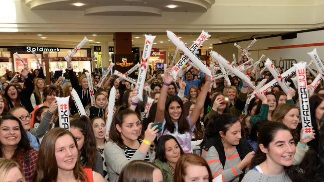 A huge crowd gathered at Knox Shopping Centre to check out the X Factor finalists – Jaymie, Jesse and Dean – in 2014. Picture: Angie Basdekis