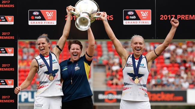 Adelaide’s Chelsea Randal, Erin Phillips and coach Bec Goddard with the 2017 premiership cup. Picture: Getty