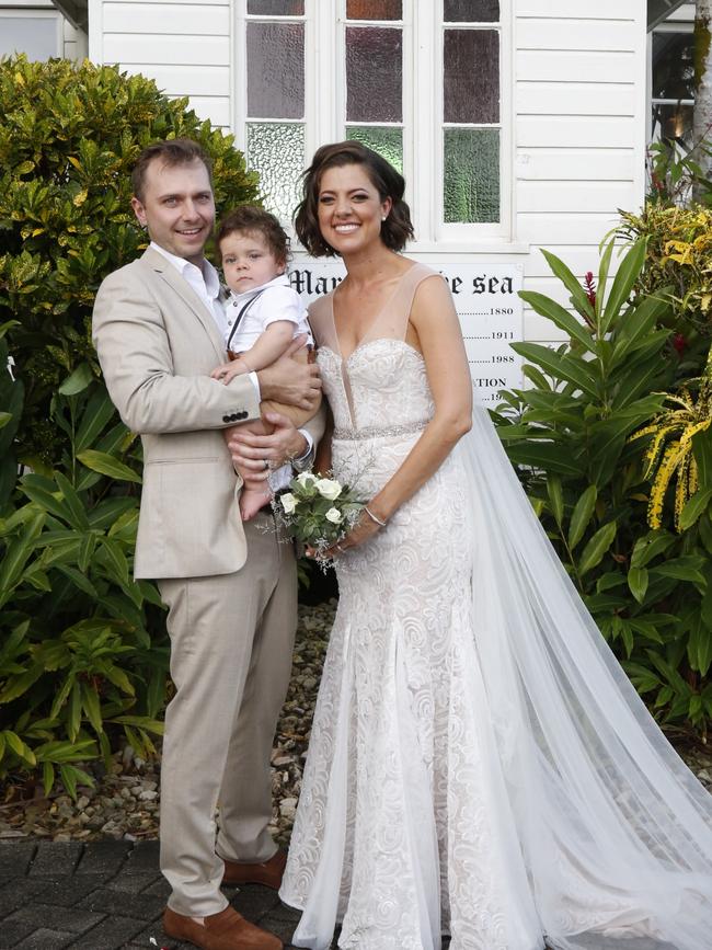 Amber Lawrence and Martin Newman on their wedding day, with son Ike. Picture: Jacky Cooke/Port Douglas Weddings