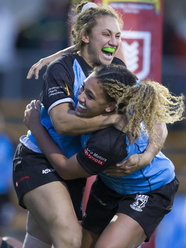 Teaghan Hartigan of Fiji scores during the Pacific Test Invitational Women's match between the Fiji Bulikula and the Papua New Guinea Orchids at Leichhardt Oval in Sydney, Saturday, June 22, 2019. (AAP Image/Craig Golding)