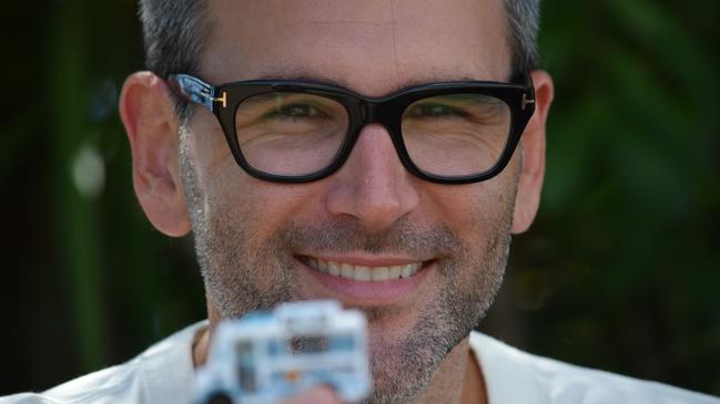 Cliff 'CK' Kern from PUFT Events holding a replica of the $10K golden toy truck hidden in Townsville.