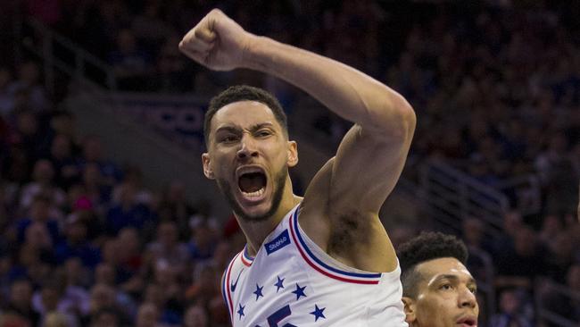 PHILADELPHIA, PA — MAY 09: Ben Simmons #25 of the Philadelphia 76ers reacts in front of Kawhi Leonard #2 of the Toronto Raptors after dunking the ball in the third quarter of Game Six of the Eastern Conference Semifinals at the Wells Fargo Center on May 9, 2019 in Philadelphia, Pennsylvania. The 76ers defeated the Raptors 112-101. NOTE TO USER: User expressly acknowledges and agrees that, by downloading and or using this photograph, User is consenting to the terms and conditions of the Getty Images License Agreement. Mitchell Leff/Getty Images/AFP == FOR NEWSPAPERS, INTERNET, TELCOS &amp; TELEVISION USE ONLY ==