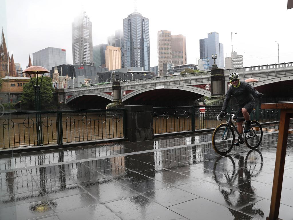 Gloomy weather hangs over Melbourne CBD. Saturday, October 2, 2021. Picture: David Crosling