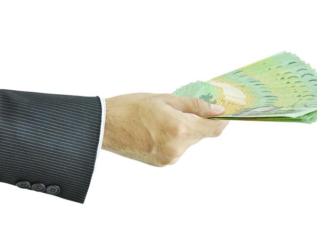 Hand holding money - Australian dollars Donation generic Handout Bribe Political donation Picture: Supplied