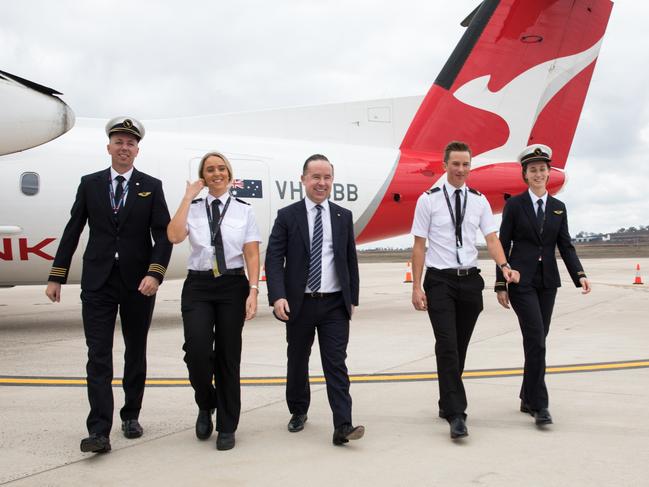 Denis Wagner, Alan Joyce, Annastacia Palaszczuk and Cameron Dick at Toowoomba's Wellcamp Airport, the site of the first Qantas pilot training academy. Qantas