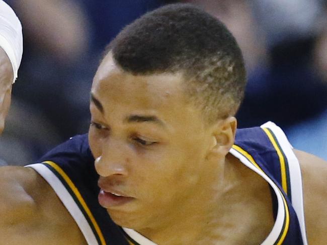 Oklahoma City Thunder guard Russell Westbrook (0) steals the ball from Utah Jazz guard Dante Exum (11) during the first quarter of a preseason NBA basketball game in Oklahoma City, Tuesday, Oct. 21, 2014. (AP Photo/Sue Ogrocki)