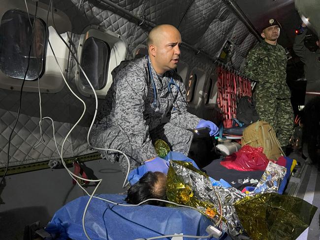 Exhausted but happy, the four children were reunited with their relatives. Picture: Handout Colombian Air Force / Colombian Air Force / AFP