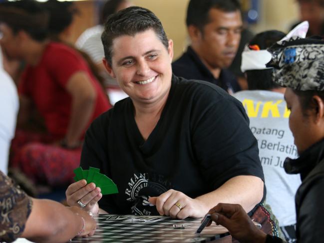 Bali nine member Renae Lawrence joins the other inmates for  a Balinese card competition  to celebrate Indonesia's Independence Day inside Bangli Jail.  Picture: Lukman Bintoro