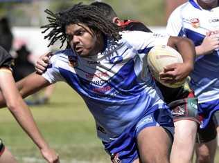 Grafton Ghosts' Under 18s front rower Lionel Johnson charges into the Panthers defensive line. Johnson was a standout for the Ghosts in a golden point loss. Picture: Matthew Elkerton