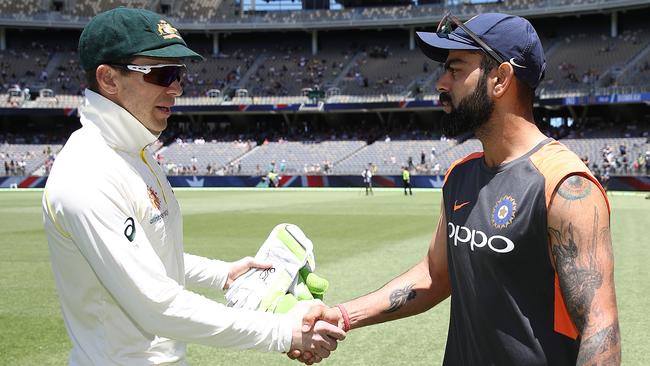 Best of enemies ... Tim Paine and Virat Kohli shake hands in Perth. Picture: Getty Images