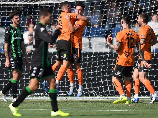 BALLARAT, AUSTRALIA - FEBRUARY 16: Brisbane Roar players celebrate a goal from Mirza Muratovic during the round 19 A-League match between Western United and the Brisbane Roar at Mars Stadium on February 16, 2020 in Ballarat, Australia. (Photo by Morgan Hancock/Getty Images)
