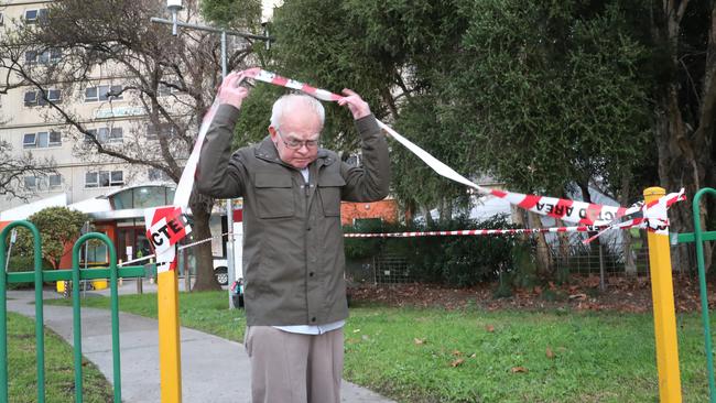 Desmond Silverwood emerges from a tight lockdown at the North Melbourne towers. Picture: NCA NewsWire/David Crosling