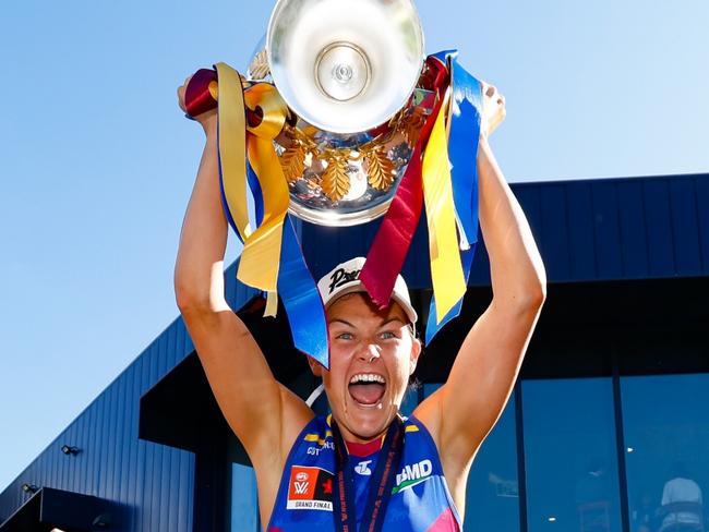 MELBOURNE, AUSTRALIA - DECEMBER 03: Sophie Conway of the Lions celebrates with the premiership cup during the 2023 AFLW Grand Final match between The North Melbourne Tasmanian Kangaroos and The Brisbane Lions at IKON Park on December 03, 2023 in Melbourne, Australia. (Photo by Dylan Burns/AFL Photos via Getty Images)