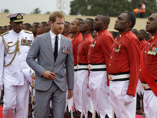 Prince Harry and a guard of honour at his official welcome ceremony in Suva. Picture: Getty