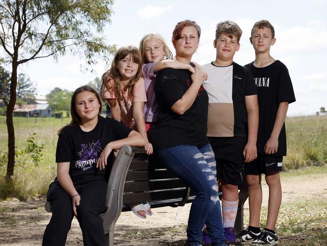 DAILY TELEGRAPH 11TH OCTOBER 2024Pictured at Rouse Hill Regional Park in Sydney is single mum Jayla England with her kids Georgina (11) Taylor (8) Lily (6) Bobby (10) and Jayce (13).Jayla is having to find ways to save money but is struggling to get by in the cost of living crisis.Picture: Richard Dobson