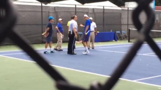 Footage has emerged of Gold Coast tennis player Bernard Tomic and fellow tennis star Viktor Troicki being forced off a court by a police officer in Washington.
