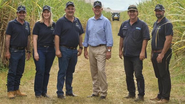 Minister for Primary Industries Tony Perrett (centre) with Canegrowers Herbert River board members Sam Torrisi, Leah Russo and Steven Marbelli (left) and local grower Darren Reinaudo and Canegrowers Herbert River manager Frank Scardamaglia (right) near Ingham on Friday. Picture: Supplied