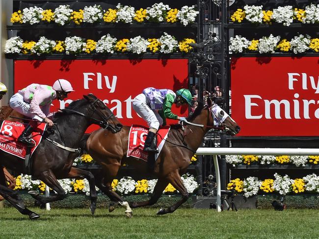 Jockey Michelle Payne of Australia on Prince of Penzance leads French horse Max Dynamite (No 8) and New Zealand horse Criterion (No 2) past the post at Flemington Racecourse on Melbourne Cup day in Melbourne on November 3, 2015. RESTRICTED TO EDITORIAL USE NO ADVERTISING USE NO PROMOTIONAL USE NO MERCHANDISING USE. AFP PHOTO/Paul CROCK