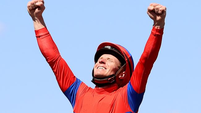 Sydney jockey James Mcdonald celebrates his win aboard Verry Elleegant. Picture: Getty Images