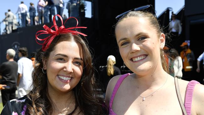 Caulfield Guineas horse race meeting, Caulfield, Victoria, Saturday 12th October 2024. Faces in the crowd. Pictured enjoying the race meeting are Rochelle and Nicola. Picture: Andrew Batsch