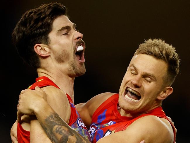 MELBOURNE, AUSTRALIA - JULY 01: Alex Sexton (left) and Brandon Ellis of the Suns celebrate during the 2021 AFL Round 16 match between the Gold Coast Suns and the Richmond Tigers at Marvel Stadium on July 01, 2021 in Melbourne, Australia. (Photo by Michael Willson/AFL Photos via Getty Images)