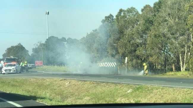 Fire Fighters had to put out a blaze which destroyed two cars following a police chase through Tweed. PHOTO: Justin Davis