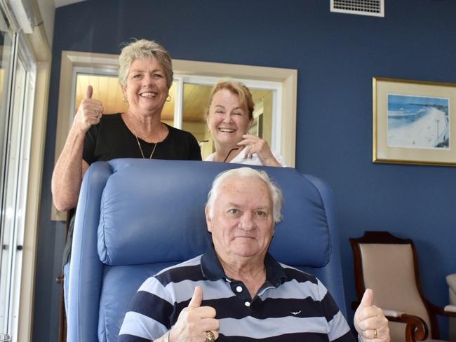 West Ballina residents John Chaseling (front), Anne Lodington (left ) and Marilyn Chaseling (right) celebrate the court's decision to oppose the proposed 300-home development by GemLife.