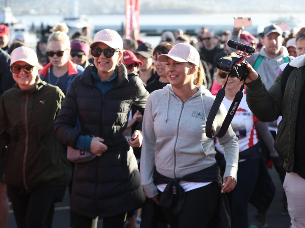 Carrie Bickmore (second from left) begins the 2019 Point to Pinnacle walk. Picture: LUKE BOWDEN