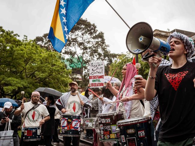 Protesters rally at the State Library in Melbourne. Picture: Tamati Smith