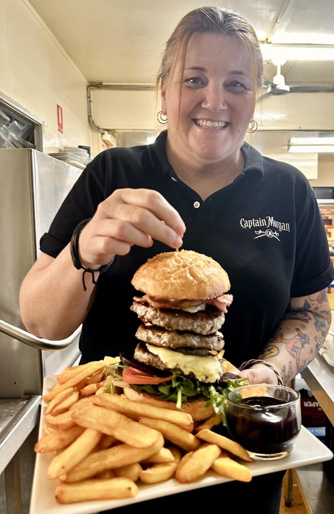 A triple patty beef burger is one three “mongrel” meals on offer at the hotel as part of the challenge.