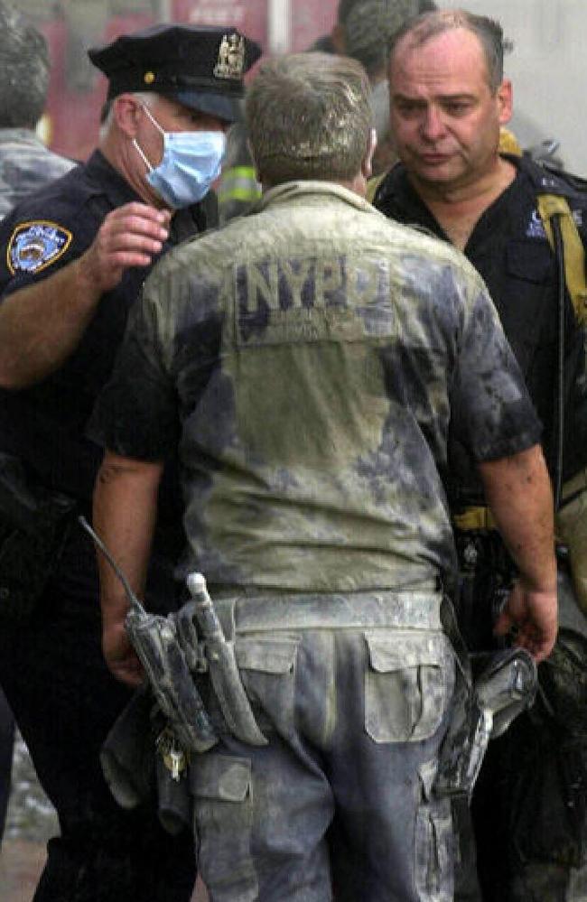 Shocked police officers at ground zero. Picture: Nathan Edwards