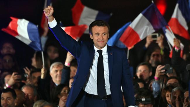 Emmanuel Macron adresses voters in front of the Eiffel Tower after beating his far-right rival Marine Le Pen for a second five-year term as president.