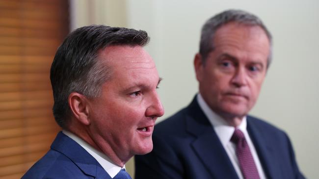 Labor leader Bill Shorten (R) and Shadow Treasurer Chris Bowen (L) hold a press conference in Melbourne, Friday, October 12, 2018. Labor are revealing today the ALP will back the Government's plan to fast-track tax cuts to small businesses. (AAP Image/David Crosling) NO ARCHIVING,