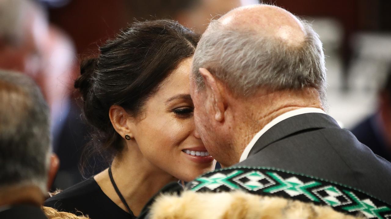 Meghan exchanges a hongi with an official. Photo: AAP Image/Getty Pool, Phil Walter