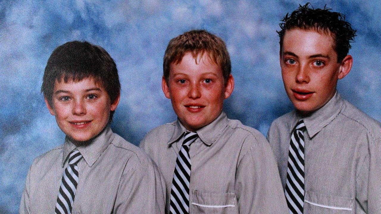 A school photo of Daniel Morcombe with twin brother Bradley and Dean.