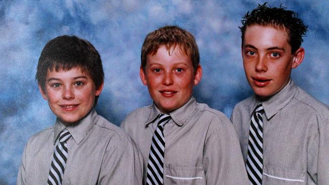 A school photo of Daniel Morcombe with twin brother Bradley and Dean.