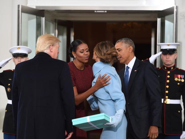 US President Barack Obama and First Lady Michelle Obama welcome then President-elect Donald Trump and his wife Melania to the White House in Washington, DC on January 20, 2017. Picture: AFP