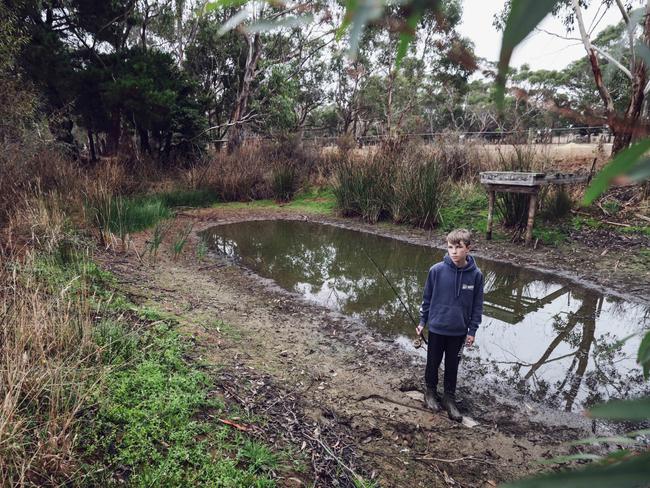 Tom Cleary at the family dam that he normally fishes in just outside of Portland. Picture: Nicole Cleary