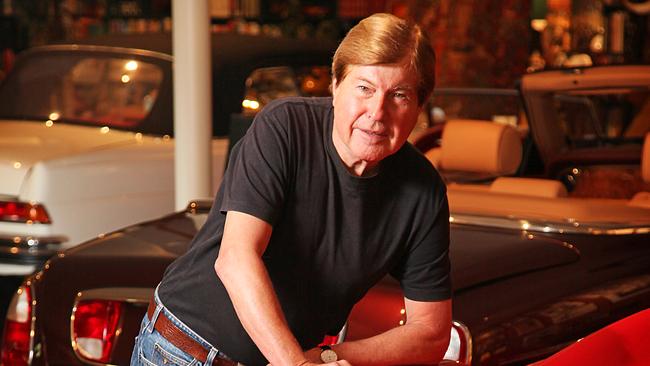 Cordeaux, with his car collection in his garage in Glen Osmond.