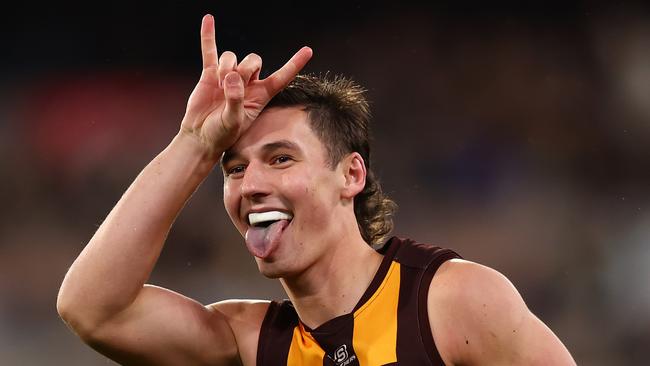 MELBOURNE, AUSTRALIA - JULY 20: Connor Macdonald of the Hawks celebrates kicking a goal during the round 19 AFL match between Hawthorn Hawks and Collingwood Magpies at Melbourne Cricket Ground on July 20, 2024 in Melbourne, Australia. (Photo by Graham Denholm/AFL Photos/via Getty Images)