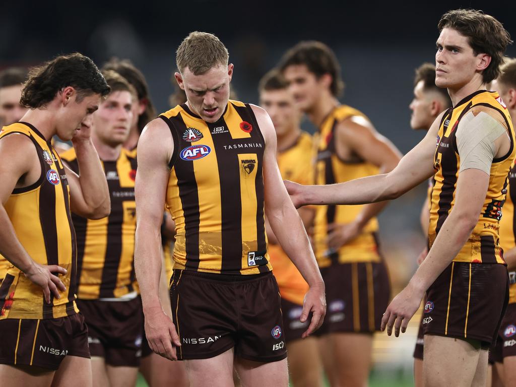 The Hawks trudge off. Picture: Quinn Rooney/Getty Images