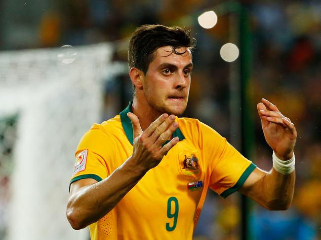 SYDNEY, AUSTRALIA - JANUARY 13: Tomi Juric of Australia reacts after missing an opportunity during the 2015 Asian Cup match between Oman and Australia at ANZ Stadium on January 13, 2015 in Sydney, Australia. (Photo by Daniel Munoz/Getty Images)