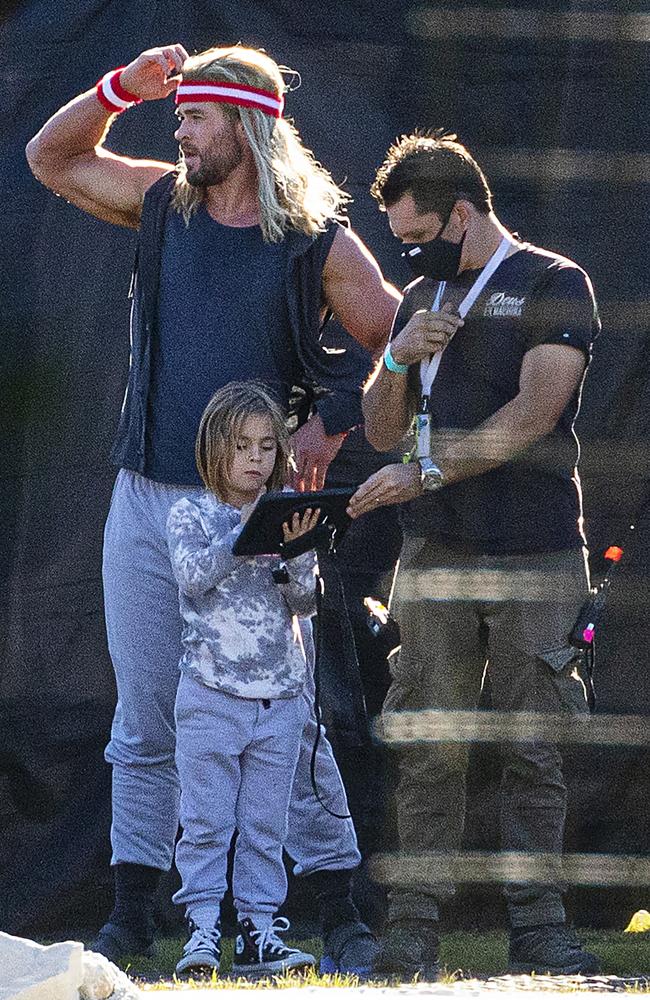 Chris Hemsworth channels Olivia Newton-John while filming Thor in ...