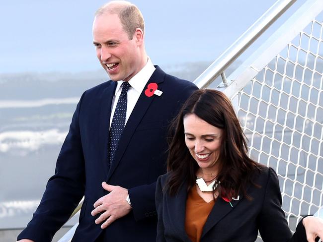 Britain's Prince William (L) arrives with New Zealand's Prime Minister Jacinda Ardern (R) at the Royal New Zealand Air Force (RNZAF) Air Movements Terminal in Christchurch on April 25, 2019. - Prince William paid tribute to Australian and New Zealand troops on April 25 at an emotional Anzac Day ceremony, six weeks after the Christchurch mosques massacre. (Photo by Hannah Peters / POOL / AFP)