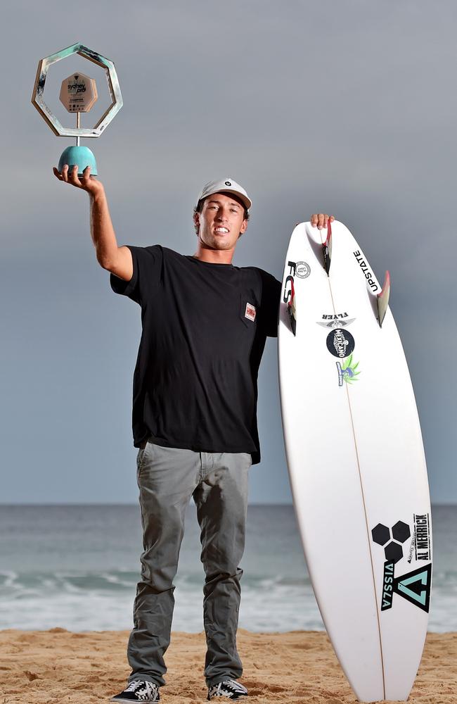 Jordy Lawler poses with his Sydney Surf Pro trophy. Picture: (AAP IMAGE / Troy Snook)