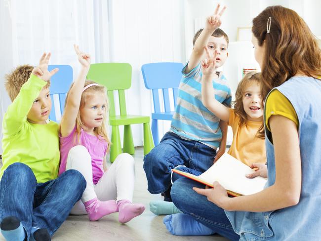 Generic photo of a childcare worker and children in a daycare centre