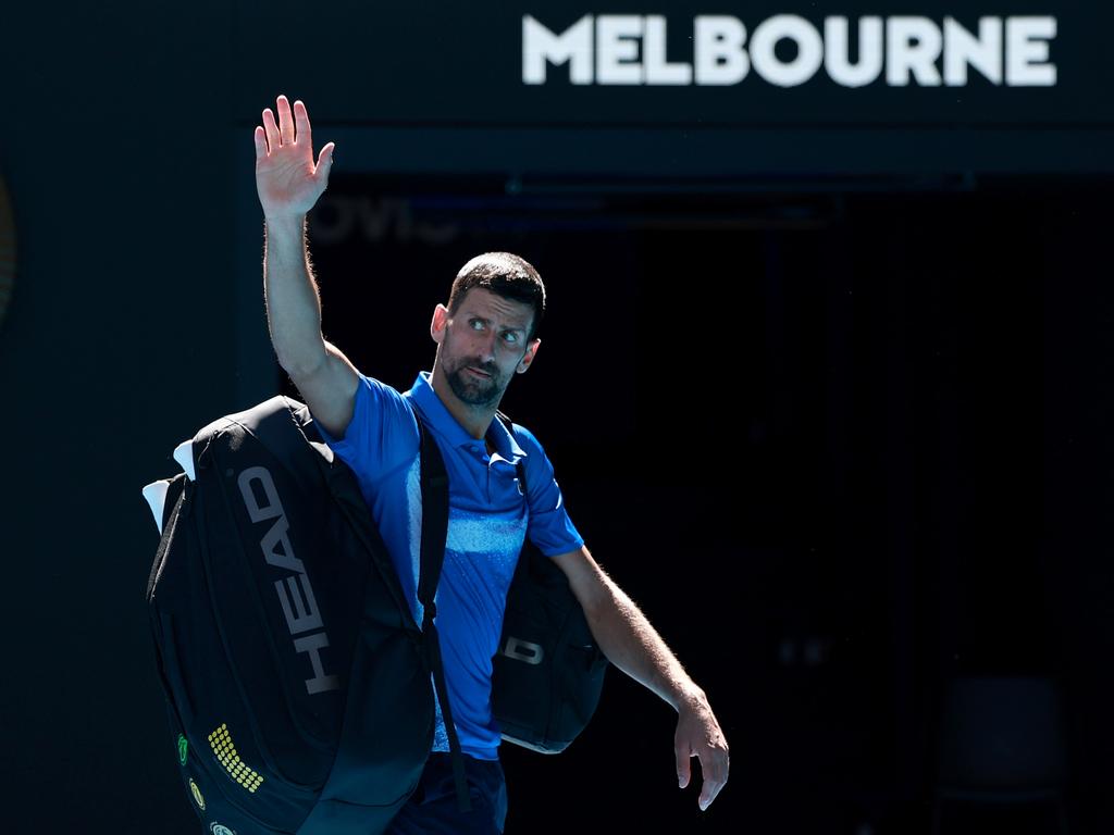 Novak Djokovic departs Rod Laver Arena on Friday. Picture: Darrian Traynor/Getty Images.