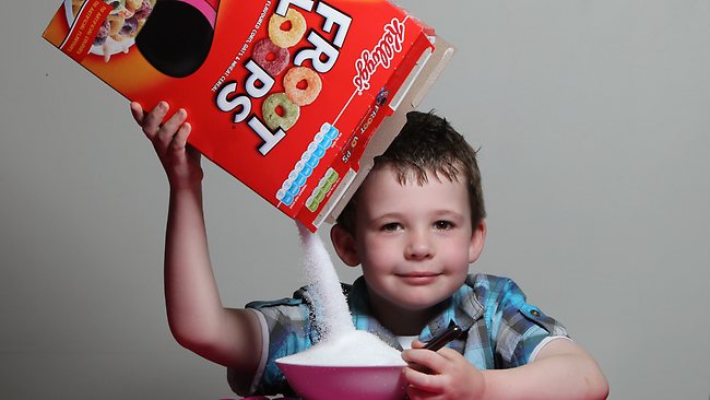 Zak Hemmerling tips sugar out of Fruit Loops cereal box