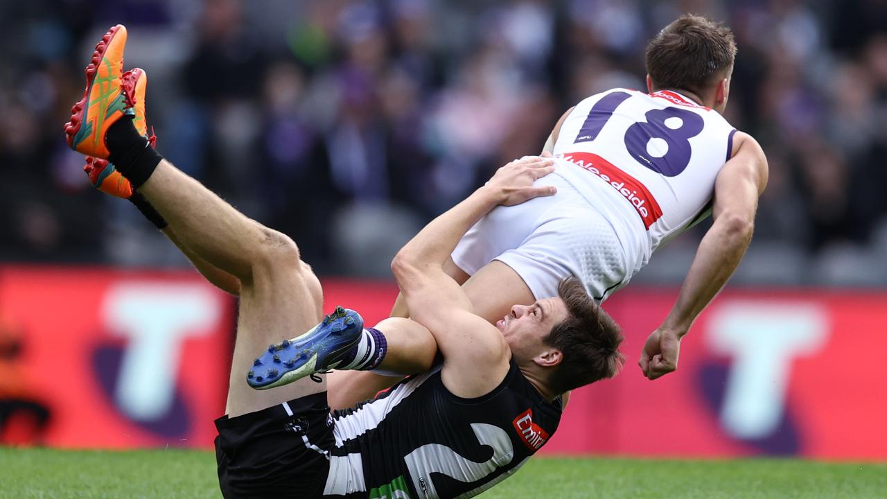 Jack Crisp tries to bring down Darcy Tucker. Picture: Michael Klein